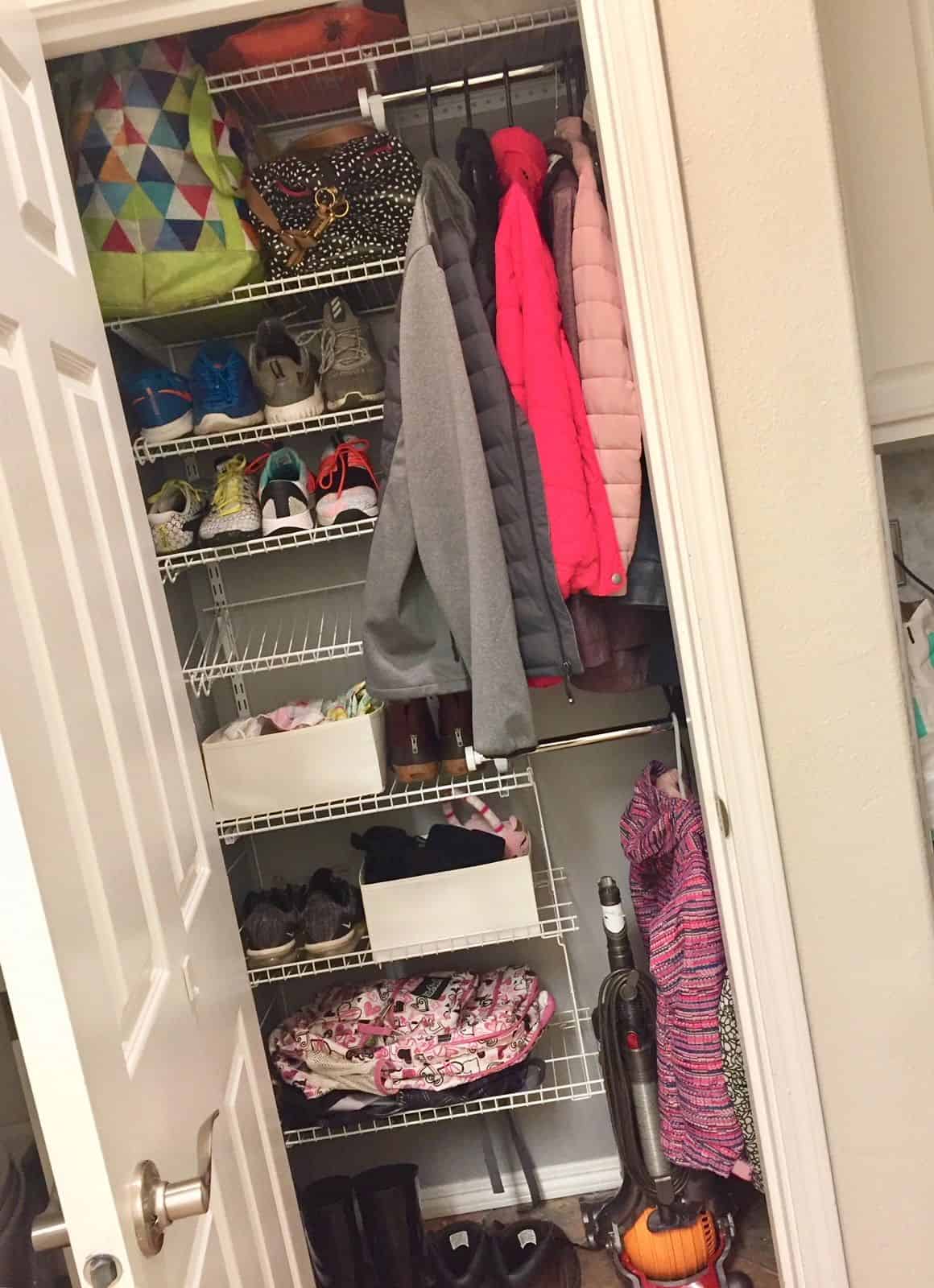 Coat closet complete with an extra shoe rack...