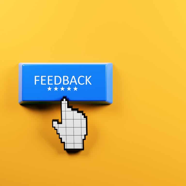 A picture of a blue computer tab with the word "FEEDBACK" written on it. This represents giving feedback to support small businesses.